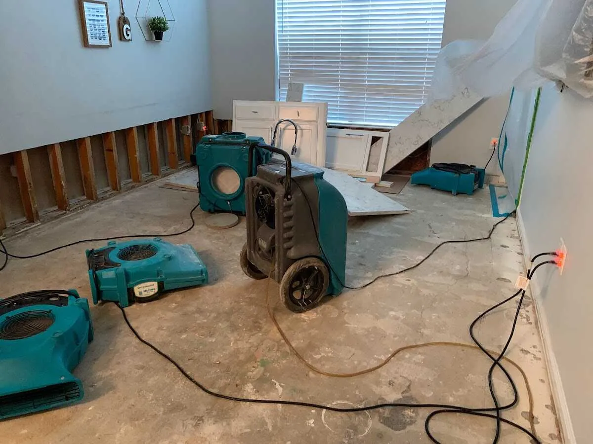 Dehumidifier in flood-cut room for Water Damage Restoration in White Oak